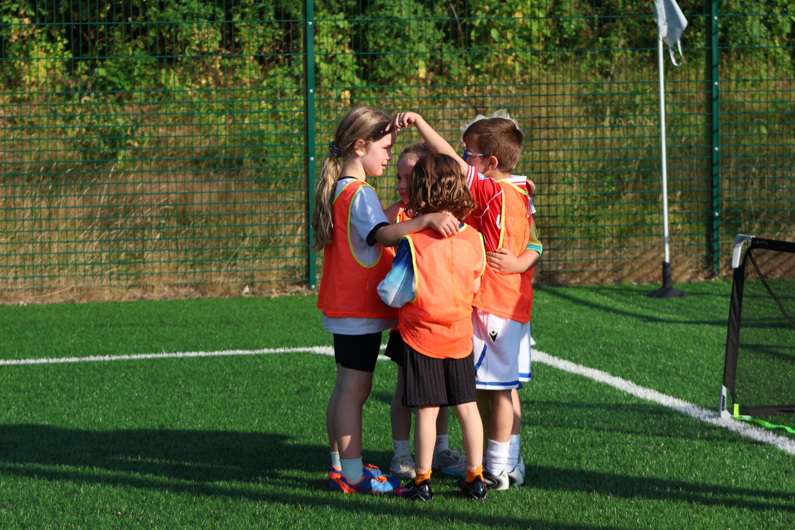 Children taking part in a THA football session